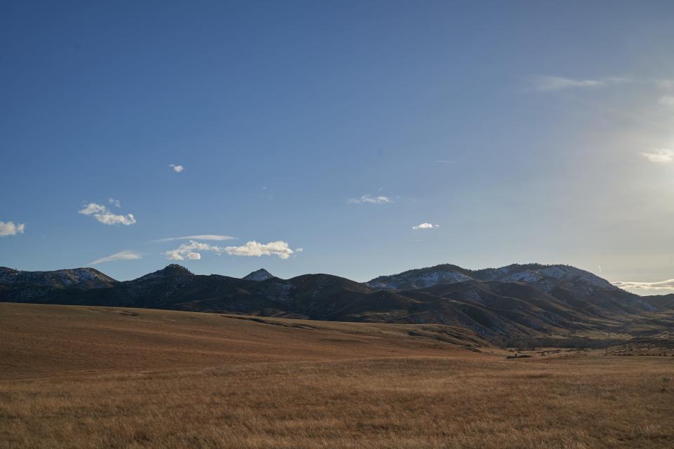 Mountains are seen in the landscape near the Livermore Community Hall at 2044 W. County Road 74E.