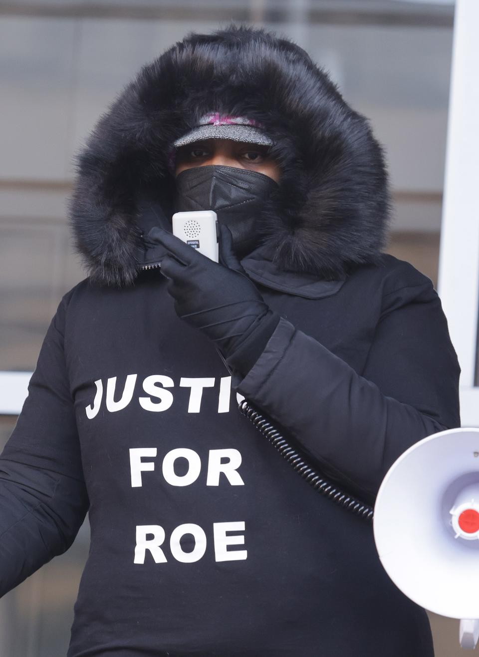 Yvette Williams, sister of James Williams, speaks at a protest outside the Canton police station.