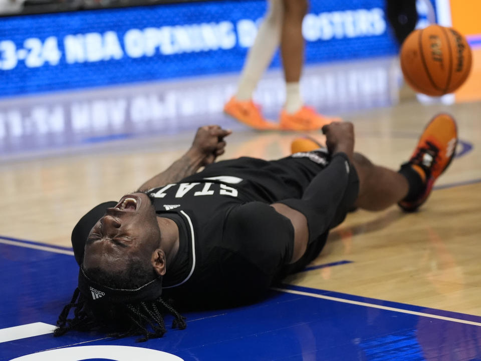 Mississippi State forward Cameron Matthews (4) reacts after scoring against Tennessee during the first half of an NCAA college basketball game at the Southeastern Conference tournament Friday, March 15, 2024, in Nashville, Tenn. (AP Photo/John Bazemore)