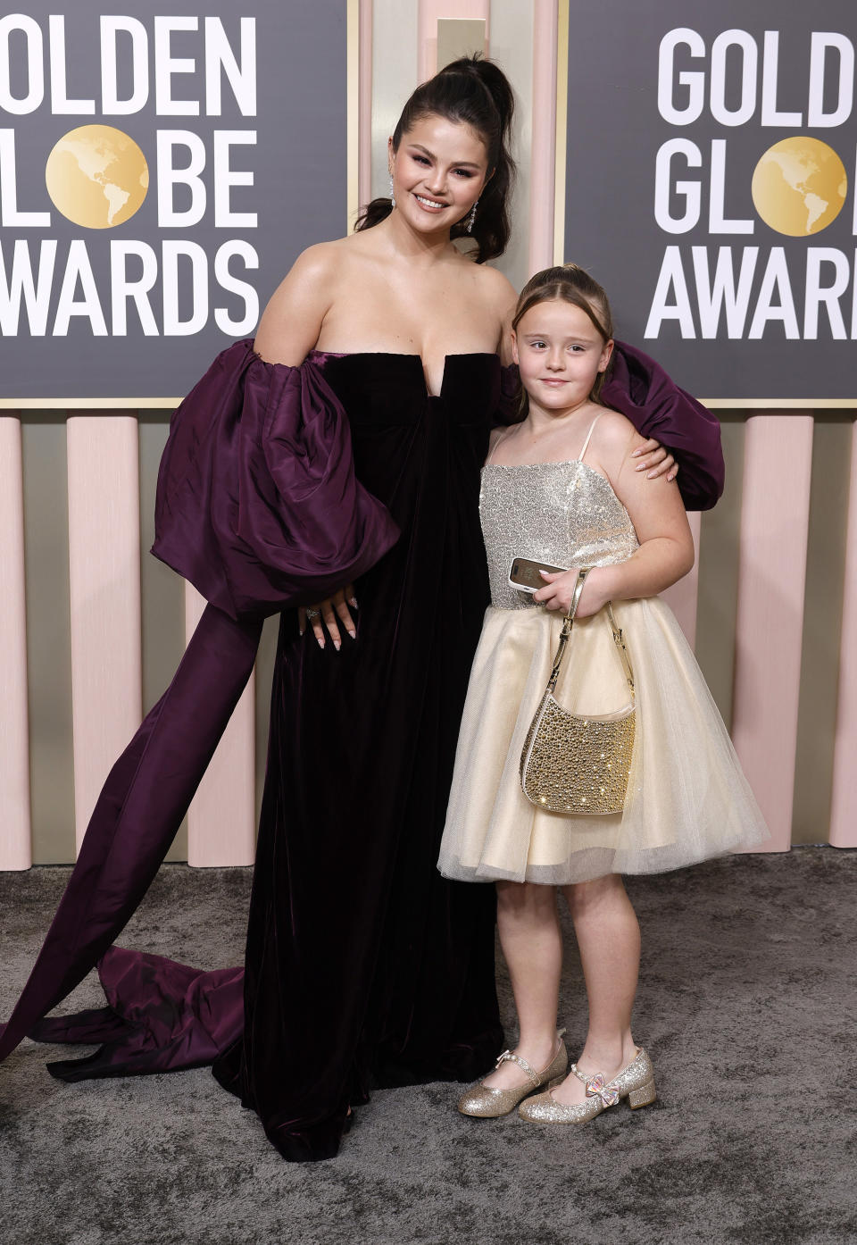 Selena with her sister on the Golden Globes red carpet