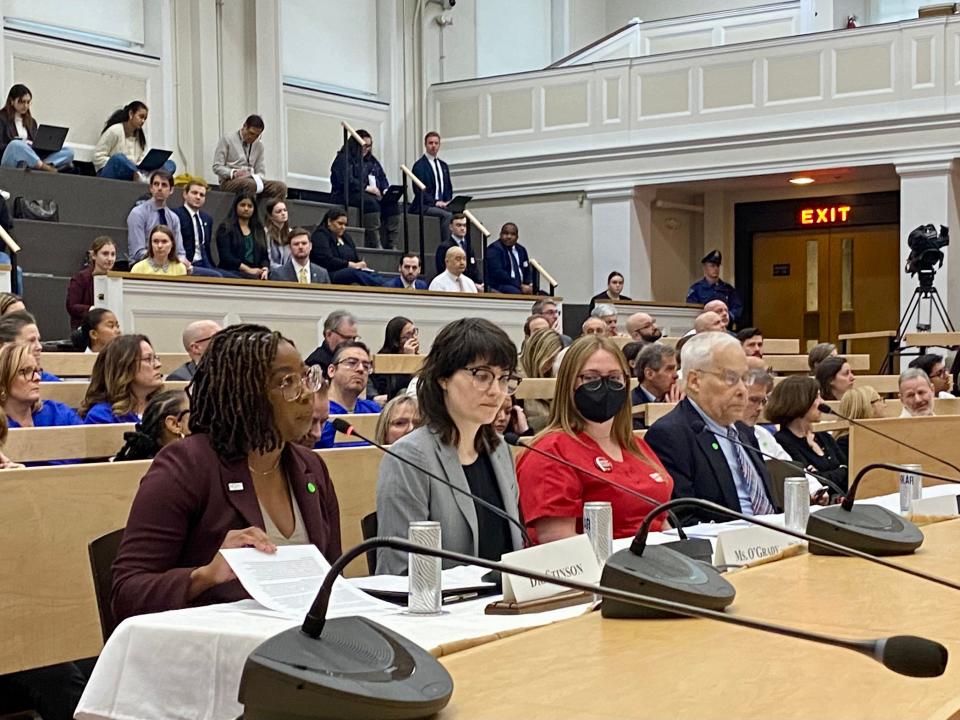 Dr. Ellana Stinson, left, an emergency room doctor who has worked at Brockton's Good Samaritan Medical Center, speaks at a U.S. Senate subcommittee hearing on private equity's impact on health care at the State House on Wednesday, April 3, 2024, in the midst of the financial crisis enveloping Good Sam's owner, Steward Health Care.