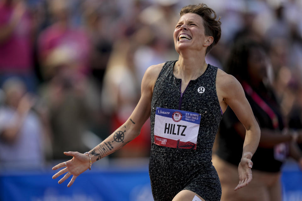 Nikki Hiltz celebrates after winning the women's 1500-meter final during the U.S. Track and Field Olympic Team Trials, Sunday, June 30, 2024, in Eugene, Ore. (AP Photo/Charlie Neibergall)