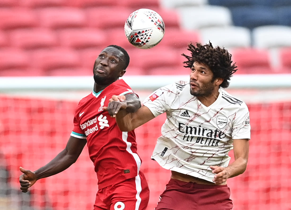 Soccer Football - FA Community Shield - Arsenal v Liverpool - Wembley Stadium, London, Britain - August 29, 2020  Arsenal's Mohamed Elneny in action with Liverpool's Naby Keita, as play resumes behind closed doors following the outbreak of the coronavirus disease (COVID-19) Pool via REUTERS/Justin Tallis