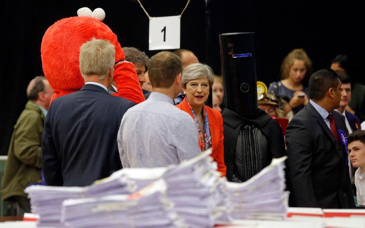 Lord Buckethead stands next to Theresa May and Elmo - all competing for Maidenhead - AP