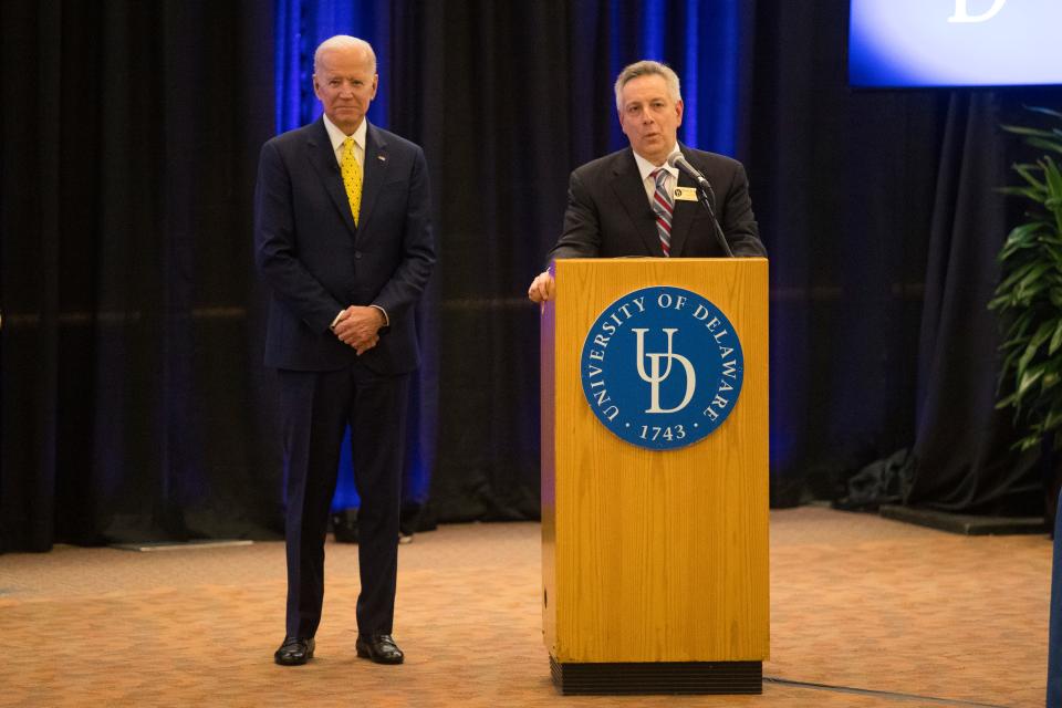 University of Delaware President Dennis Assanis, right, with UD alumnus Joe Biden, announces the naming of the Joseph R. Biden Jr. School of Public Policy and Administration at the Trabant Student Center in 2018.