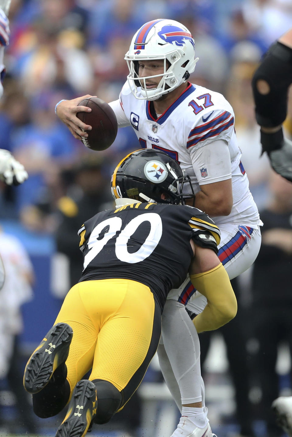 Buffalo Bills quarterback Josh Allen (17) is sacked by Pittsburgh Steelers outside linebacker T.J. Watt during the second half of an NFL football game in Orchard Park, N.Y., Sunday, Sept. 12, 2021. (AP Photo/Joshua Bessex)