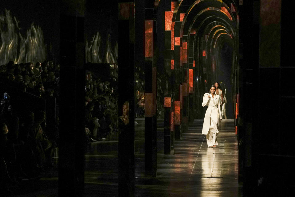 A model wears a creation for the Fendi Spring Summer 2022 collection during Milan Fashion Week, in Milan, Italy, Wednesday, Sept. 22, 2021. (AP Photo/Antonio Calanni)