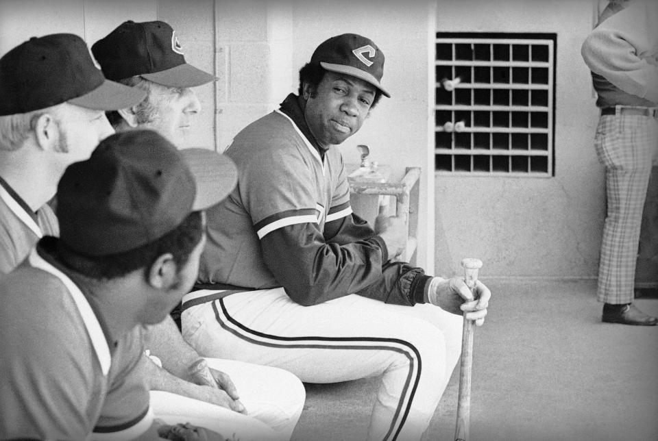 Cleveland player-manager Frank Robinson talks with players before the start of their game with the California Angels, May 26, 1975, in Anaheim, Calif. On June 6, 1975, Robinson hit two three-run homers in a 7-5 win over the Texas Rangers.