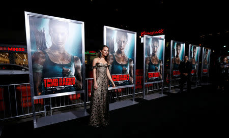 FILE PHOTO - Cast member Alicia Vikander poses at the premiere for "Tomb Raider" in Los Angeles, California, U.S., March 12, 2018. REUTERS/Mario Anzuoni