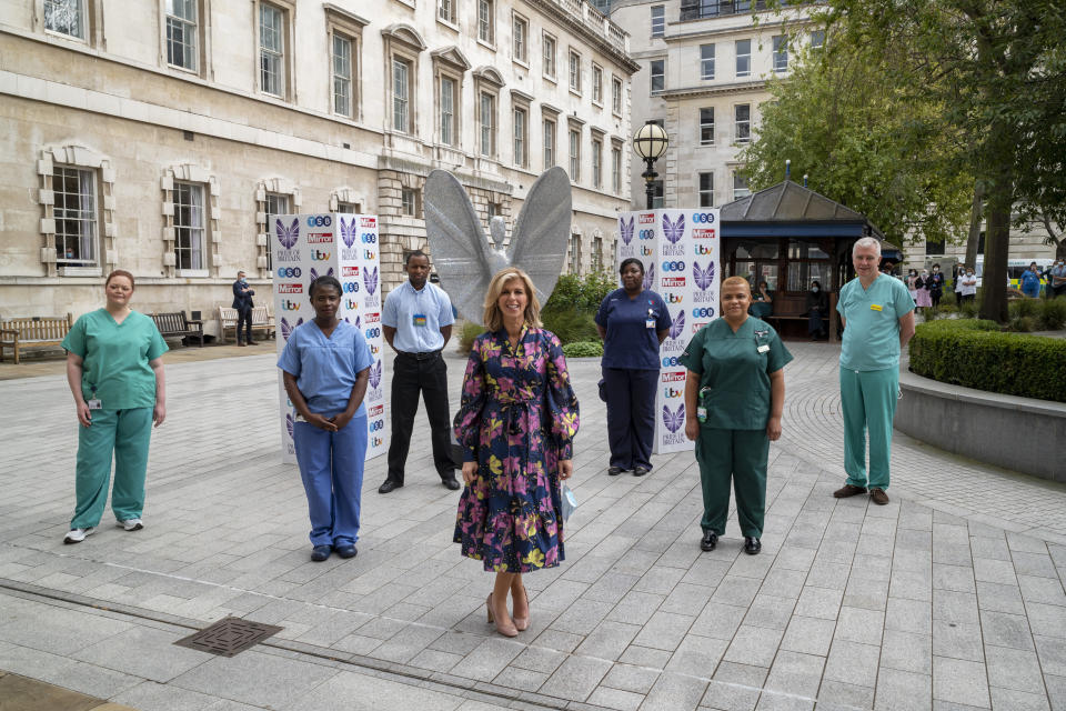 EMBARGOED TO 1800 WEDNESDAY OCTOBER 28 Undated handout photo issued by Daily Mirror Pride of Britain Awards of Kate Garraway with NHS staff at St Bartholomew's in the City of London (left to right) Physiotherapist Charlotte Carmichael, ITU support nurse Martha Saperong, Porter Heder Lopes Landim, ITU. Matron Keisha Mills, health care assistant Marion Jones and ITU. Consultant Dr Simon Finney.