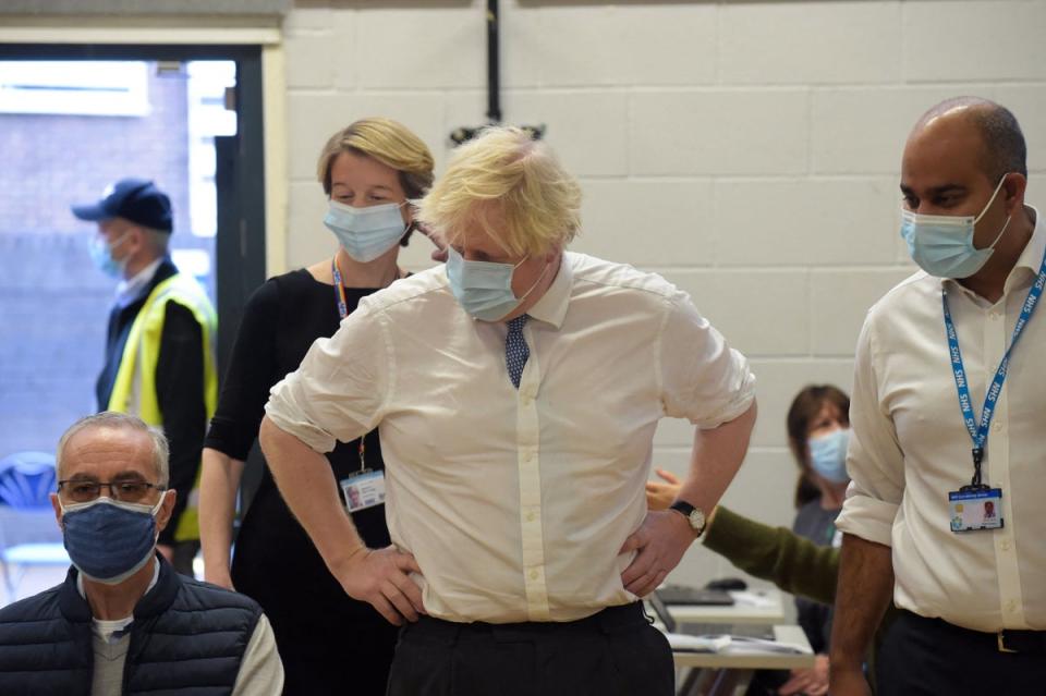 Prime Minister Boris Johnson visits the Health at the Stowe vaccination centre in central Londo (POOL/AFP via Getty Images)