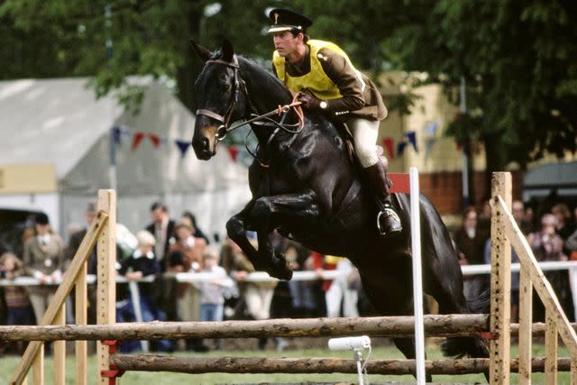 <p>Tim Graham Photo Library via Getty</p> The future King Charles competes on his horse Candlewick during a triathlon event at the Royal Windsor Horse Show in May 1979.