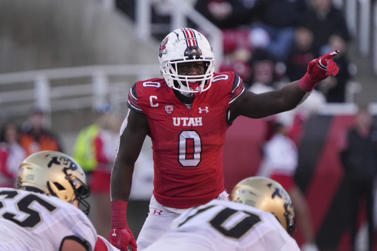 Utah linebacker Devin Lloyd (0 ) readies for a play in the second half of an NCAA college football game against Colorado Friday, Nov. 26, 2021, in Salt Lake City. (AP Photo/George Frey)