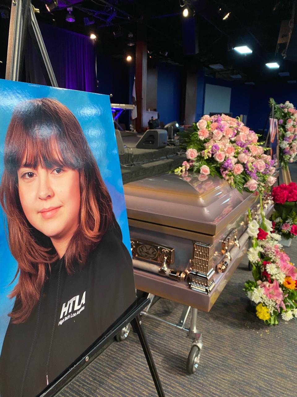 Pictures of Valentina Orellana-Peralta flanked her flower-covered casket during her funeral at City of Refuge church in Los Angeles.