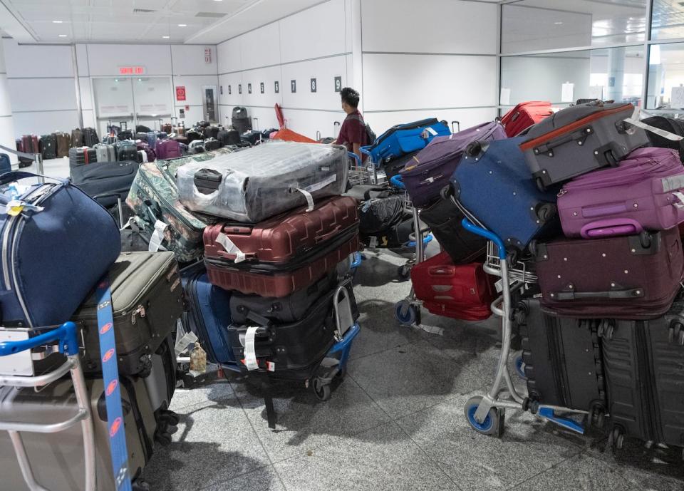 Large piles of unclaimed baggage could be spotted at Trudeau airport on Wednesday.