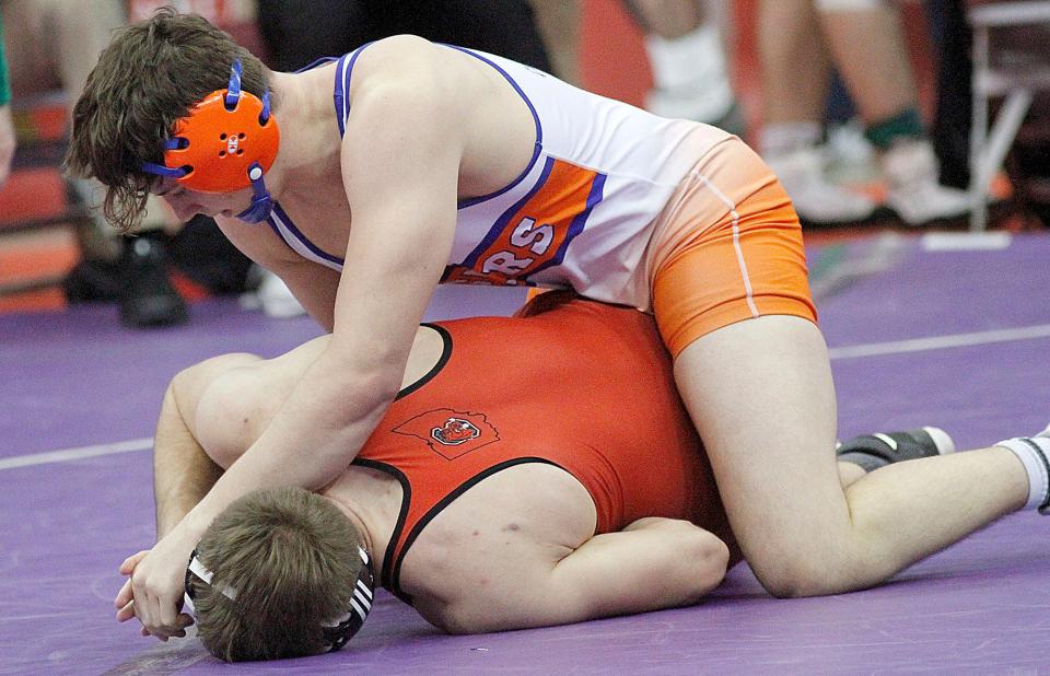 Galion's Landon Campbell wrestles Steubenville's Brandon Kinney during their match Friday, March 11, 2022 at the OHSAA State Wrestling Championship at the Jerome Schottenstein Center in Columbus. TOM E. PUSKAR/TIMES-GAZETTE.COM