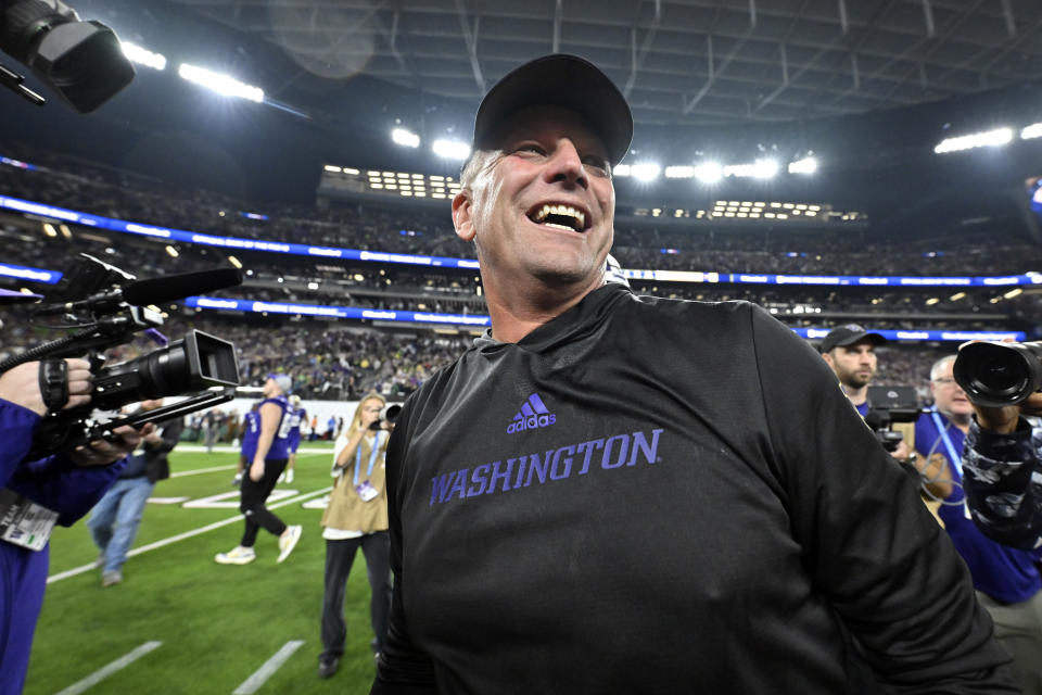 FILE - Washington coach Kalen DeBoer smiles after the team's victory over Oregon in the Pac-12 championship NCAA college football game, Dec. 1, 2023, in Las Vegas. DeBoer has made a rapid rise through the coaching ranks. He won three NAIA national championships as head coach at the University of Sioux Falls from 2005-09 and had five coaching stops in 12 years before landing at Washington. (AP Photo/David Becker, File)