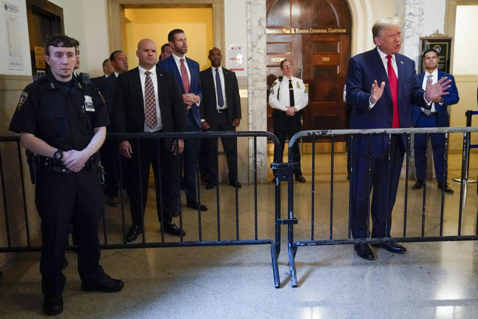 Former President Donald Trump speaks to the media before entering the courtroom at New York Supreme Court, Wednesday, Oct. 4, 2023, in New York. (AP Photo/Mary Altaffer)