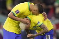 Brazil's Neymar is embraced at the end of the World Cup quarterfinal soccer match between Croatia and Brazil, at the Education City Stadium in Al Rayyan, Qatar, Friday, Dec. 9, 2022. (AP Photo/Darko Bandic)