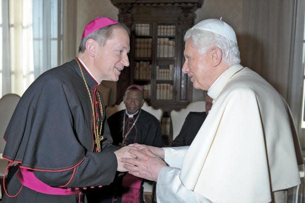Springfield Bishop Thomas J. Paprocki, left, meets with Pope Benedict XVI during his “ad limina” visit at the Apostolic Palace in Vatican City in February 2012. An ad limina visit is an obligatory visit made by bishops to Rome where they meet with the pope and Vatican officials. Pope Benedict, who resigned in February 2013, died Saturday.