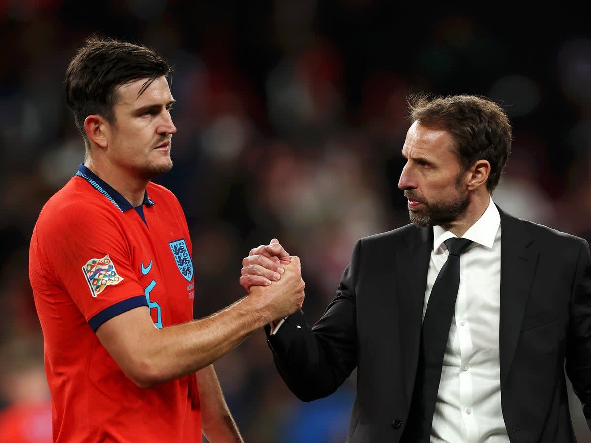 Gareth Southgate kept faith in Harry Maguire, while England’s players have not turned on their coach (The FA via Getty Images)