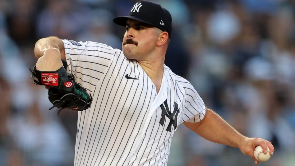 New York Yankees starting pitcher Carlos Rodon (55) pitches against the Tampa Bay Rays during the second half at Yankee Stadium