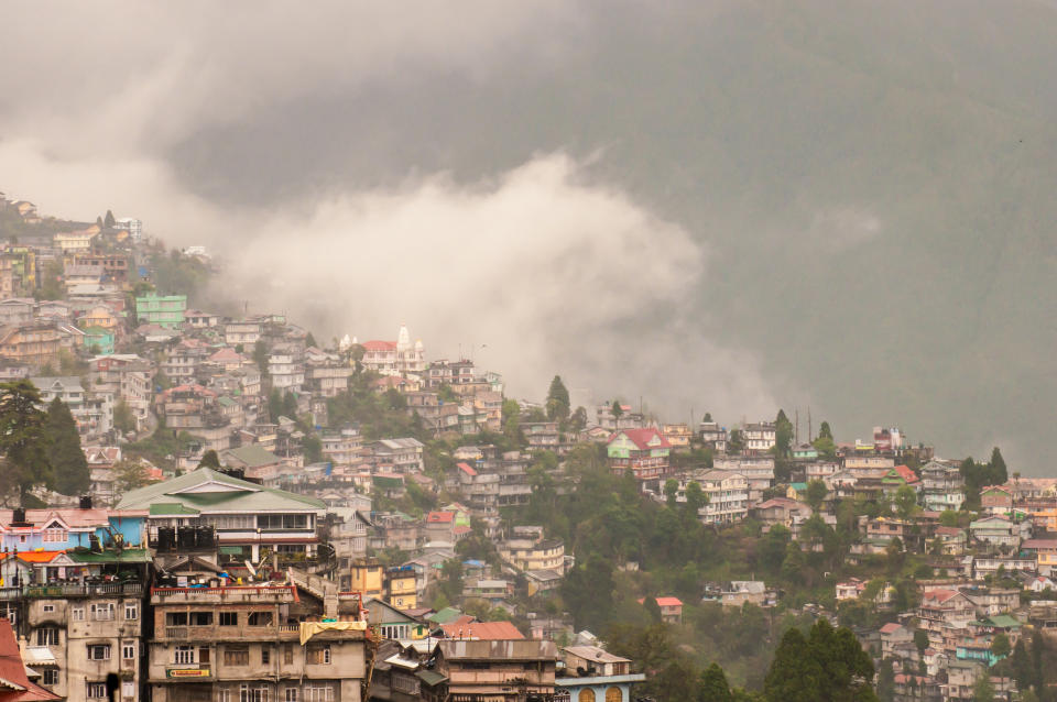 Darjeeling town in fog, India