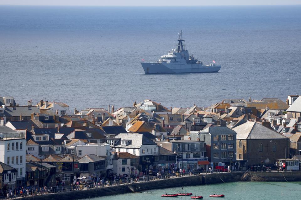 A royal navy vessel provides security for the G7 summit in the Cornish beach resort of Carbis Bay (Reuters)