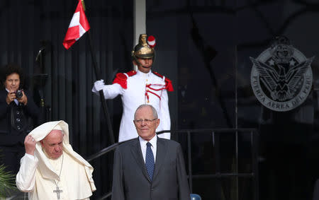 Pope Francis is greeted by Peru's President Pedro Pablo Kuczynski as he arrives in Lima, Peru, January 18, 2018. REUTERS/Alessandro Bianchi