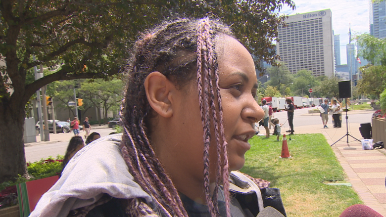 Children in superhero capes protest with Black Lives Matter outside U.S. Consulate