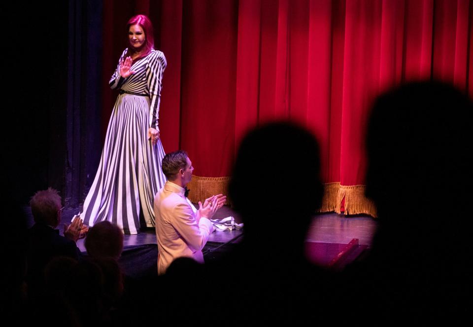 Priscilla Presley waves as she receives a standing ovation during the Honoring Priscilla Presley: The Artist, The Woman event Friday, July 22, 2022, at Theatre Memphis. The event featured speakers and music performances.