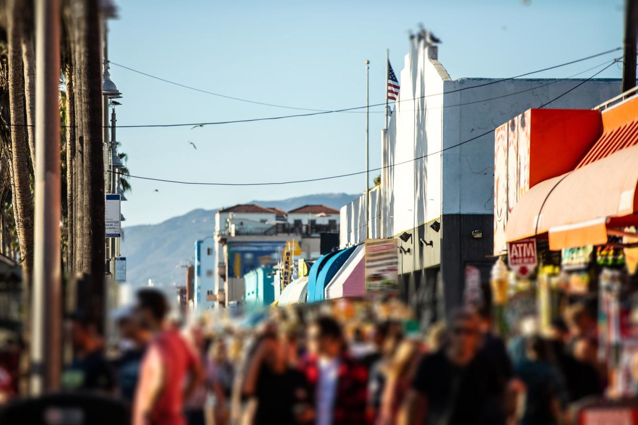 crowds on Venice Beach boardwalk in Los Angeles