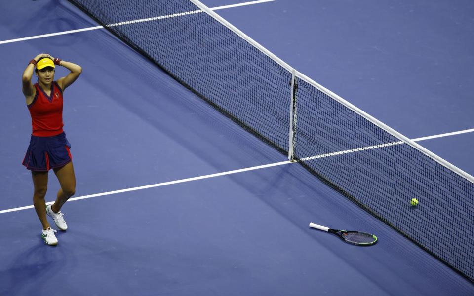 Raducanu puts her hands on her head at the moment of victory - SHUTTERSTOCK