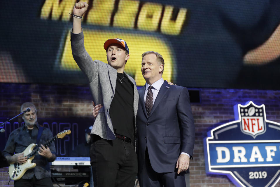Missouri quarterback Drew Lock poses with NFL Commissioner Roger Goodell after the Denver Broncos selected Lock in the second round of the NFL football draft, Friday, April 26, 2019, in Nashville, Tenn. (AP Photo/Mark Humphrey)