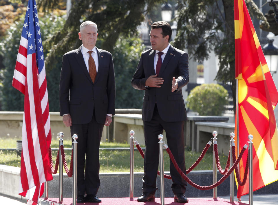 U.S. Defense Secretary James Mattis, left, is welcomed by Macedonian Prime Minister Zoran Zaev, right, upon his arrival at the government building in Skopje, Macedonia, Monday, Sept. 17, 2018.Mattis arrived in Macedonia Monday, condemning Russian efforts to use its money and influence to build opposition to an upcoming vote that could pave the way for the country to join NATO, a move Moscow opposes. (AP Photo/Boris Grdanoski)