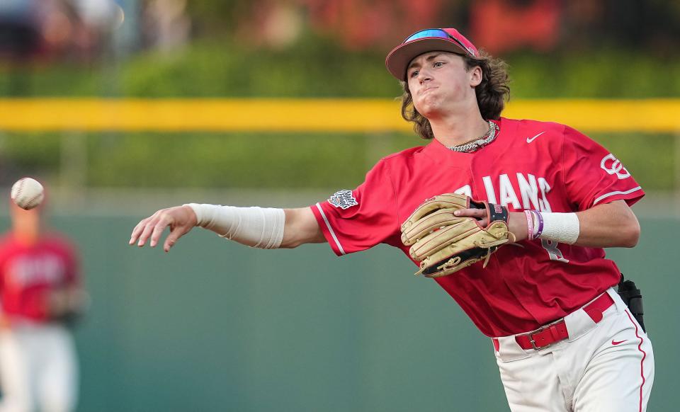 Center Grove Trojans infielder Gannon Grant (8) throws the ball Saturday, June 17, 2023, during the IHSAA Class 4A baseball state finals at Victory Field in Indianapolis. 