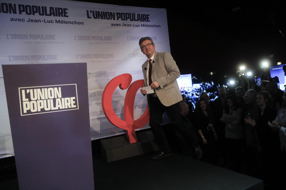 FILE - French far-left candidate Jean-Luc Melenchon walks onto the stage to comment on preliminary results of the first round of the presidential election in Paris, France, Sunday, April 10, 2022. Jean-Luc Melenchon arrived third in the presidential election with 22% of the votes. Even though he didn't make it to the second round, he launched a call to make him Prime Minister by giving him a leftist majority at the National Assembly. (AP Photo/Michel Spingler, File)