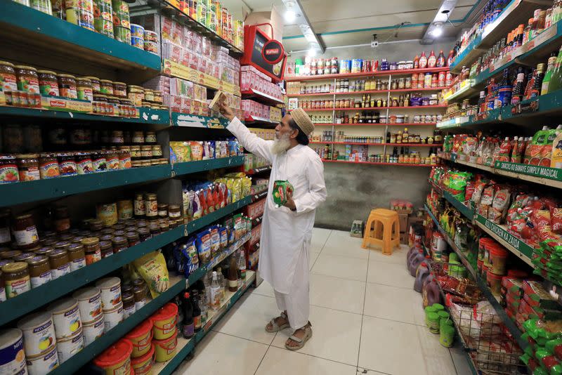 Man shops for grocery items in Peshawar