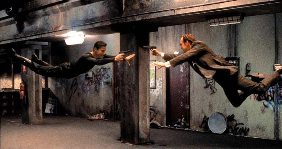 Neo (Keanu Reeves) and Agent Smith (Hugo Weaving) engage in some bullet time ballet in <em>The Matrix.</em> (Photo: Warner Bros./courtesy Everett Collection)