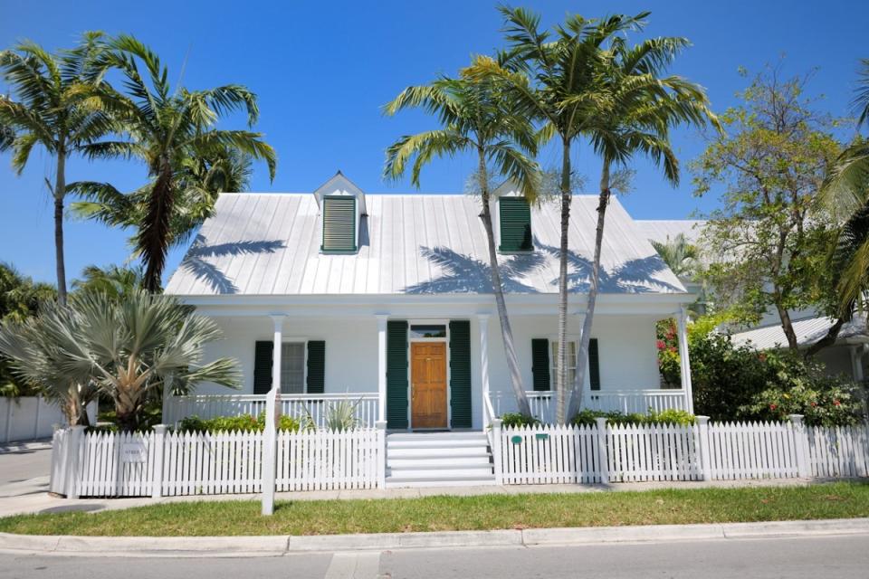 White house in Florida with palm trees