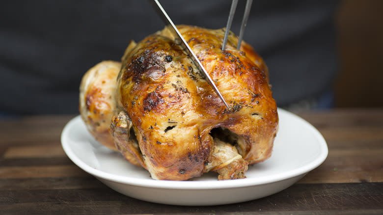 rotisserie chicken on white plate