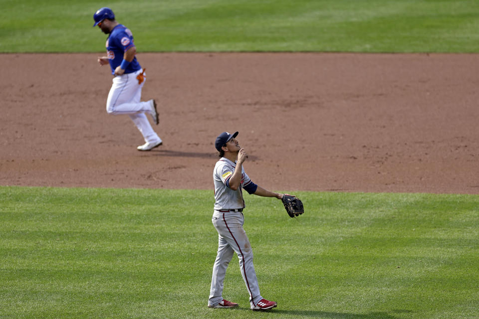 Atlanta Braves' Nicky Lopez reacts after the Braves defeated the Mets in the first baseball game of a doubleheader on Saturday, Aug. 12, 2023, in New York. The Braves won 21-3. (AP Photo/Adam Hunger)