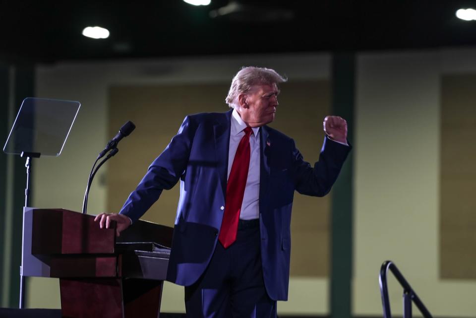 Former President Donald Trump gestures as he speaks before members of the Club 47 group at the Palm Beach County Convention Center on June 14, 2024, in West Palm Beach, Florida.