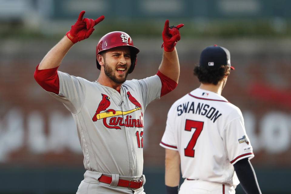 St. Louis Cardinals' Paul DeJong celebrates after hitting a double to score a run in the second inning of Game 5 of their National League Division Series baseball game against the Atlanta Braves, Wednesday, Oct. 9, 2019, in Atlanta. (AP Photo/John Bazemore)