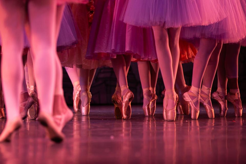 Ballet dancers stand on pointe at the dress rehearsal of Corpus Christi Ballet's "The Nutcracker" at Selena Auditorium Saturday, Dec. 9, 2023.