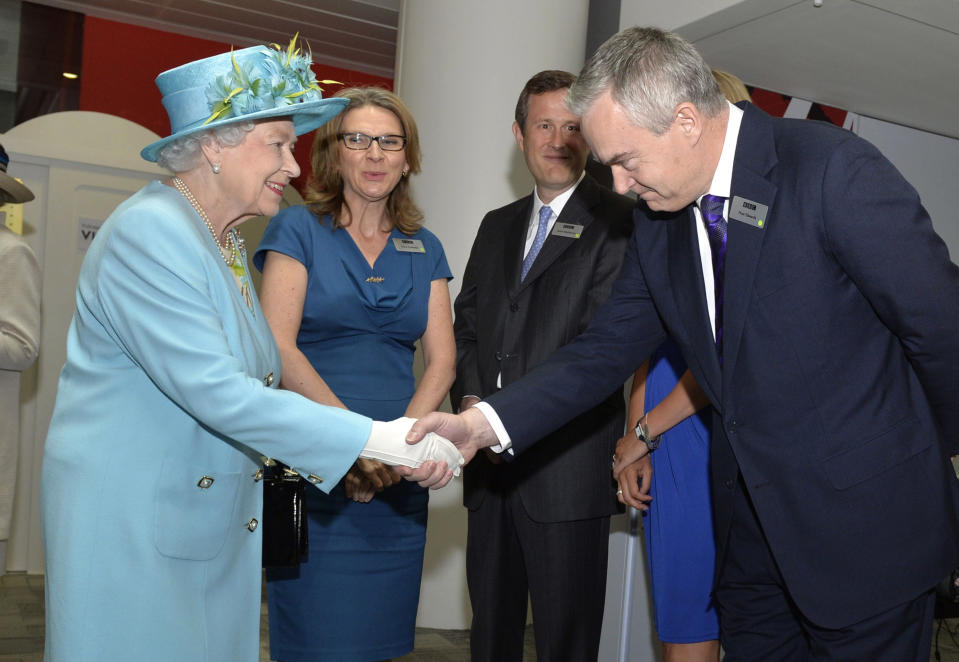 LONDON, UNITED KINGDOM - JUNE 07:  Queen Elizabeth II meets newsreader Huw Edwards as she opens the new BBC Broadcasting House on June 7, 2013 in London, England. (Photo by Arthur Edwards - WPA Pool/Getty Images)