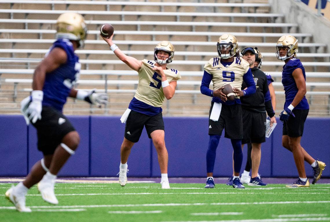 University of Washington Huskies quarterback Dylan Morris, 5, throws the ball during a drill at the first day of Fall practice at Husky Stadium on Thursday, Aug. 4, 2022 in Seattle, Wash.