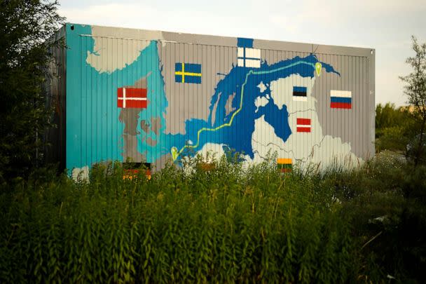 PHOTO: A painting showing the Nord Stream pipelines is displayed on a container near the Nord Stream 1 Baltic Sea pipeline in Lubmin, Germany, July 20, 2022. (Markus Schreiber/AP, FILE)