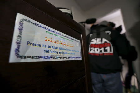 A religious sticker is shown inside the home of suspects Syed Rizwan Farook and Tashfeen Malik in Redlands, California December 4, 2015, following Wednesday's attacks. REUTERS/Mario Anzuoni