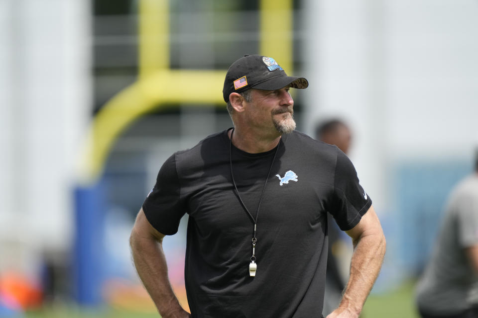 Detroit Lions head coach Dan Campbell observes drills during an NFL football practice, Monday, Aug. 14, 2023, in Allen Park, Mich. (AP Photo/Carlos Osorio)